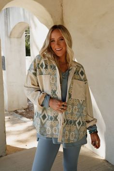 A true boho closet essential is the Tribal Blitz Jacket. This will become one of your go-to pieces to wear from season to season! Comfortable woven fabric with mix of solid corduroy and so cool print throughout Relaxed and loose jacket silhouette Classic collared neckline with a button-up front closure Loose long sleeves and convenient contrast front patch pockets Rounded bottom edge for added movement Perect boho layering piece! Pair with: Dora Low Back Seamless Bralette, On The Go V Neck Ribbe Bohemian Outerwear For Day Out In Fall, Bohemian Outerwear For Fall Day Out, Bohemian Cotton Outerwear For Day Out, Bohemian Outerwear With Pockets Relaxed Fit, Oversized Bohemian Outerwear For Day Out, Bohemian Oversized Outerwear For Day Out, Bohemian Outerwear For Fall With Relaxed Fit, Bohemian Beige Outerwear With Pockets, Bohemian Winter Outerwear In Relaxed Fit