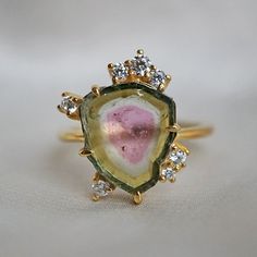 Handcrafted in 14K gold with natural sliced watermelon tourmaline #watermelontourmaline #engagementringsunique Watermelon Tourmaline Engagement Ring, Sliced Watermelon, Watermelon Tourmaline Jewelry, Gemstone Rings Unique, Rock Ring, Watermelon Tourmaline Ring, Tourmaline Jewelry, Jewelry Lookbook, Tourmaline Ring