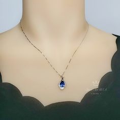 "Full 925 silver Tanzanite necklace decorated with CZ stone Tanzanite jewelry ◆◆Pendant Holder (bezel & Bail) : High Quality 925 Sterling Silver Main Stone:7*9mm Created Tanzanite Whole Pendant Size ( include bail) : 16mm Accent Stone : Cubic Zirconia ◆◆ Necklace chain : Platinum coated 925 sterling silver Box Chain from 16\" to 20\" The model wearing the default size with 18\". Please pay attention to the size Some photos have been enlarged to show details. And others need to minimize for f Formal Drop Necklace With Birthstone, Elegant Teardrop Birthstone Drop Necklace, Pear Shaped Sapphire Necklace For Gift, Pear Shaped Sapphire Necklace As Gift, Pear-shaped Sapphire Necklace Gift, Elegant Tanzanite Necklace As Gift, Elegant Tanzanite Necklace For Gift, Elegant Tanzanite Necklace Gift, Elegant Teardrop Sterling Silver Necklace