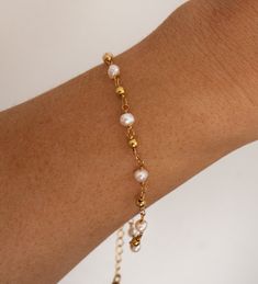 Gold Plated and Freshwater Pearl Beaded Chain Bracelet Real Freshwater Pearls Length: approx. 6 - 8 inches (adjustable) 18 Gold Electroplated This bracelet is made with a real freshwater pearls, therefore each pearl is unique and no two bracelet are alike. White Pearl Bracelet With Adjustable Chain, Adjustable Pearl White Bracelets With Pearl Chain, Pearl Chain Bracelets, White Pearl Bracelets With Adjustable Chain, Adjustable Pearl White Bracelet With Pearl Chain, Dainty Beaded Round Pearl Bracelet, Beaded Chain Pearl Bracelet Gift, Adjustable Beaded Pearl Bracelet As Gift, Gold Bracelet With Pearl Drop Gift