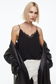 Camisole top in jersey. Extra-narrow shoulder straps and low-cut  lace-trimmed V-neck at front and back. Lace Trim Cami Top, Black Cami Top, Black Cami, Lace Trim Cami, Black Sleeveless Top, Strappy Top, Black Camis, Comfy Fashion, Cami Top