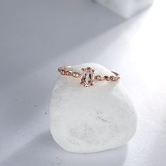 "[ Made to Order ] * Metal: 925 Sterling Silver * Custom Gold Color: Rose Gold plated, Yellow Gold plated, Silver * Main Stone Type: Peach Morganite, Oval, 6*4mm * Side Stone Type: Cubic Zirconia, 10 pcs * Gold KT: 14K Gold * Custom Gold Color: Rose Gold, Yellow Gold, White Gold * Main Stone Type: Peach Morganite, Oval, 6*4mm * Side Stone Type: Natural Diamond, 10 pcs, 0.026 ct. Jewelry Maintenance Tips - avoid chemicals - avoid collision - clean with a soft cloth - avoid water - remove jewelry Rose Gold Oval Diamond Promise Ring, Oval Rose Gold Birthstone Ring With Prong Setting, Oval Topaz Promise Ring With Rose Cut Diamonds, Oval Topaz Ring With Rose Cut Diamonds For Promise, Oval Rose Gold Birthstone Ring With Center Stone, Oval Crystal Ring With Rose Cut Diamonds For Promise, Rose Gold Oval Promise Ring, Oval Rose Gold Birthstone Promise Ring, Rose Gold Oval Birthstone Promise Ring