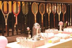 there are many tennis rackets on the table