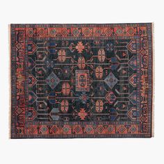 an old rug with many different colors and patterns on it, including blue, red, orange