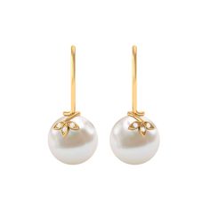 Product Details This solitaire pearl earring pair is designed in an elegant drop style that reflects the timelessness of a pearl. It is topped with a metal foliage-inspired motif that is embedded with round Diamond. The pearl drop earring pair is secured with a fishhook that ensures you style it seamlessly, whether you are on the go or super occupied with work. Product Information SKU SHP-EARRINGS012210398 Weight 1.28 gm (Approximate) FRESHWATER PEARL INFORMATION No.of Stones 2 Pieces Total Weig Pearl Earring, Diamond Drops, The Pearl, Drop Earring, Diamond Drop Earrings, Pearl Drop Earrings, Pearl Drop, Fish Hook, Round Diamond