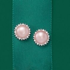 Ross-Simons - 7-7.5mm Pink Cultured Pearl, .13ct t. w. Diamond Earrings in Silver. Sparkle in diamonds and feel pretty in pink! 7-7.5mm cultured freshwater pink button pearls rest in halos of .13 ct. t. w. diamond rounds. The soft pink orbs have an ethereal quality that contrasts beautifully with the striking diamonds. Set in sterling silver. Post/clutch, diamond and pink pearl earrings. Pearl birthstones are the perfect gift for June birthdays. Elegant Pink Diamond Earrings With Accents, Pink Diamond Earrings With Accents, Pink Diamond Earrings With Diamond Accents For Wedding, Pink Diamond Earrings With Accents For Wedding, Pink Diamond Earrings With Prong Setting For Wedding, Pink Brilliant Cut Round Diamond Earrings, Pink Sparkling Stone Round Earrings, Pink Round Earrings With Sparkling Stones, Pink Sparkling Round Earrings