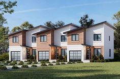 three story house with multiple windows and landscaping