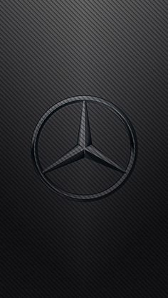 the mercedes logo on a black background