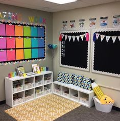 a classroom with colorful bulletin boards and bookshelves