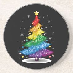 a colorful christmas tree on a black background beverage coaster