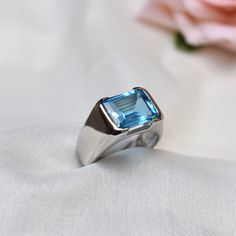 D E T A I L S - Stone: Natural Swiss Blue Topaz Stone Size: 10x12mm Material: 925 Sterling Silver The Fit: True to US ring size Finish: Silver & Smooth S H I P P I N G & P R O D U C T I O N - My current production time is 2-6 business days, which means after those days are up, your order ships! I make everything custom to order, by hand, but I promise you it's worth the wait! R U S H - M Y - O R D E R - If you're in a rush to get your pretty new pieces, please send me a message and I'll Male Proposal Ring, Blue Topaz Ring Sterling Silver, Future Board, Mens Ring Designs, Swiss Blue Topaz Ring, Rock Rings, Ring Everyday, Mens Rings, Bold Rings