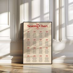 a seating chart is displayed in front of a window