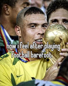 a man holding up a soccer trophy with the words how i feel after playing football barefoot