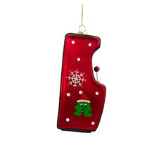 a christmas ornament hanging from the side of a red and green number one