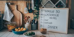 a kitchen counter topped with lots of different types of food