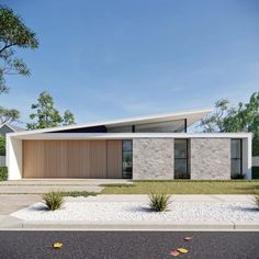 the modern house is surrounded by trees and grass