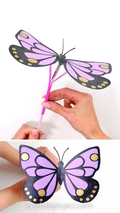 the butterfly is being made out of paper and then painted purple with gold dots on its wings