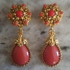 This Is Authentic Jose & Maria Barrera Earrings. These Lovely Haute Couture Earrings Are Done In A 24k Yellow Gold Plate. Gorgeous Coral Colored Stones Designed Earrings Are Sprinkled With Swarovski Crystals In Coral And 24k Gold-Plated Throughout The Earrings. The Backs Are Marked, "Barrera." Handmade In The U.S.A. These Are Brand New And Have Never Been Worn. This Is From Neiman Marcus And Is Not The Cheap Barrera From Avon. I Purchased These From Neiman Marcus Many Years Ago!! These Measure 2 Red Teardrop Chandelier Earrings For Formal Occasions, Elegant Red Bridal Earrings, Elegant Orange Clip-on Earrings, Orange Teardrop Jewelry For Formal Occasions, Elegant Orange Chandelier Earrings Gift, Elegant Orange Chandelier Earrings For Gift, Red Clip-on Earrings For Wedding, Orange Clip-on Earrings For Formal Occasions, Formal Orange Clip-on Earrings