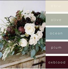 an arrangement of flowers and greenery in shades of brown, green, white, and grey