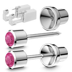 three different types of piercings with pink stones on them, including an earring and two