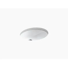 an overhead view of a white ceiling light