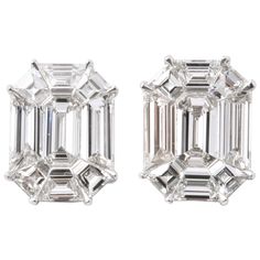 These earrings give the illusion of 7-8 carat EACH emerald cut studs! 4.65 carats of F VS special cut diamonds, masterly set to look like one emerald cut diamond. Set in 18k white gold The earrings measure 12.8 mm x 10 mm approximately. A wearable pair of earrings, full of sparkle! Emerald Earrings Studs, Emerald Cut Diamond, Drop Dead, White Gold Earrings, White Gold Jewelry, Pompeii, Emerald Cut Diamonds, Fine Jewellery Earrings, Gold Jewelry Fashion