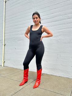 We're pretty sure the scoop neck unitard will be your newest super stretchy BFF! Made from our 100% recycled tricot, this pull on, all-in-one look makes getting dressed a breeze. The unitard has full length legs, a scoop neck and back, and all the stretch you need for a perfect form fitting jumpsuit that can take you from yoga to a night out on the town.🤸‍♀️ Fitted Sporty Bodysuit With Scoop Neck, Sporty Fitted Bodysuit With Scoop Neck, High Stretch Full-length Solid Unitard, Sporty Fitted Scoop Neck Bodysuit, Casual Black Unitard For Summer, Full Length High Stretch Solid Unitard, Solid Color High Stretch Full Length Unitard, Fitted Unitard For Summer, Fitted Spring Activewear With Thumbholes