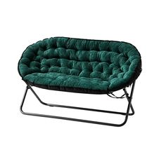 a green chair that is on top of a metal frame and has a black seat cushion