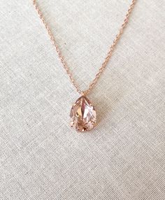 "Gorgeous, simple morganite pink Swarovski crystal necklace. Pendant crystal is 14x10mm. Rose gold finished metal. Also available in gold or silver plated. Chain is 18\" long." Blush Necklace, Pink Crystal Necklace, Morganite Necklace, Morganite Jewelry, Pretty Jewelry Necklaces, Pendant Necklace Simple, Necklace Swarovski, Magical Jewelry, Swarovski Crystal Necklace