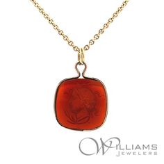 This beautiful vintage pendant is crafted in 10 karat yellow gold and features a carved amber-color glass intaglio of Demeter with wheat in her hair. The pendant measures 1 inch in length by 3/4 inch wide. The pendant is not stamped, but tested in house as 10 karat gold. The maker is unknown. Included is a 16 inch 14 karat yellow gold chain. Overall great condition with antique wear, mostly to the back of the glass intaglio which has some light scratching and scuffing. Please view all photos.  T Luxury Amber Intaglio Jewelry, Classic Yellow Gold Carnelian Jewelry, Vintage Yellow Gold Intaglio Necklace, Classic Carnelian Yellow Gold Jewelry, Luxury Carved Yellow Gold Necklaces, Classic Amber Engraved Jewelry, Classic Engraved Amber Jewelry, Antique Engraved Carnelian Jewelry, Heirloom Medallion Jewelry With Intaglio