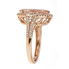 This gorgeous Gin& Grace 14k rose gold Genuine morganite and Natural diamond ring is crafted from fine and sturdy materials to combine grace and durability. This jewelry is sure to offer an elegant look to any outfit and any occasion. Gemstone colors: Pink Gemstone shapes: Oval-cut One prong-set Oval-cut Genuine Morganite measures 11 mm wide x 15 mm long Gemstone weight: 6 3/8 carats Total gemstone weight: 6 3/8 carats Diamonds:82 Diamond cut: Natural Round Diamond measurements: Each measures 1 Luxury Morganite Diamond Ring With Halo Setting, Fine Jewelry Morganite Diamond Ring In Rose Gold, Fine Jewelry Rose Gold Morganite Diamond Ring, Luxury Rose Gold Cluster Ring With Gemstone, Luxury Rose Gold Morganite Rings, Luxury Rose Gold Morganite Diamond Ring, Morganite Diamond Ring With Brilliant Cut, Rose Gold Rings With Diamond Accents And Morganite, Rose Gold Morganite Ring With Halo Design