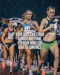 two women are running in the rain with an inspirational quote on their side that says, your body can stand almost anything it's your mind you have to conce