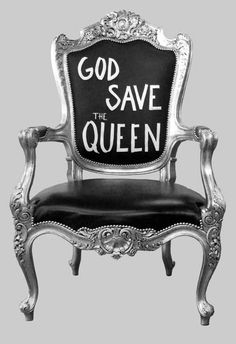 a chair with the words god save the queen painted on it