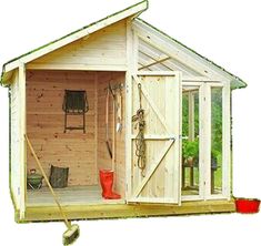 a small shed with the door open and tools in it's storage compartment inside