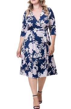 Take the guesswork out of getting ready for your next event with this effortless wrap dress that has an allover floral print and breezy A-line silhouette. 44" length (size 2X) True wrap style with side tie closure Surplice V-neck Three-quarter sleeves Unlined 95% polyester, 5% spandex Machine wash, dry flat Made in the USA of imported fabric