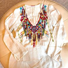 Beautiful Johnny Was Top ! Size Xs , In Perfect Condition , Never Worn ! Bohemian Multicolor Embroidered V-neck Top, Multicolor Long Sleeve Embroidered Top For Spring, Multicolor Embroidered Long Sleeve Top For Spring, Multicolor Bohemian V-neck Embroidered Top, Multicolor Embroidered Long Sleeve Beach Top, Multicolor Embroidered Top For Spring Vacation, Long Sleeve Embroidered Top For Beach, Vacation V-neck Embroidered Top With Multicolor Embroidery, Casual Multicolor Embroidered Floral Top