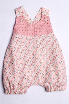 the sewing pattern for a baby's romper