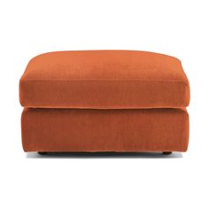 an orange footstool on a white background