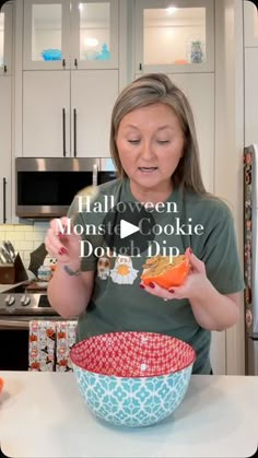 a woman is making a halloween cookie dough dip