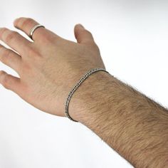 A minimalist, classy, and timeless 4mm curb stainless steel chain bracelet that will not tarnish or rust over time, even when worn in the water. 💎Free shipping on all orders💎Waterproof and non-tarnish💎Packaging that is ready to offer as a gift💎Customizable and adjustable chain length A durable, waterproof, and non-tarnish silver chain bracelet This stainless steel handmade chain bracelet is not only waterproof but also resistant to tarnishing and will maintain its shine over the years. You c Classic Cuban Link Silver Bracelet, Everyday Minimalist Cuban Link Bracelet, Minimalist Cuban Link Bracelet For Everyday, Minimalist Cuban Link Bracelet, Classic Cuban Link Metal Bracelet For Everyday Wear, Classic Sterling Silver Curb Chain Bracelet For Everyday, Classic Cuban Link Metal Bracelet For Everyday, Classic Metal Cuban Link Bracelet For Everyday, Classic Adjustable Curb Chain Bracelet