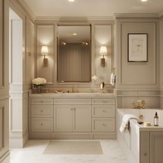 a large bathroom with two sinks and mirrors