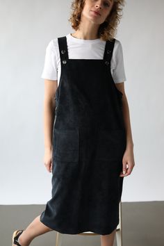 Casual Black Cotton Pinafore Dress, Black Suspender Dress For Fall, Black Sleeveless Pinafore Dress For Fall, Black Cotton Pinafore Dress For Spring, Black Spring Pinafore Dress For Work, Spring Black Pinafore Dress For Work, Black Dungaree Dress, Black Dungaree, Cord Pinafore Dress