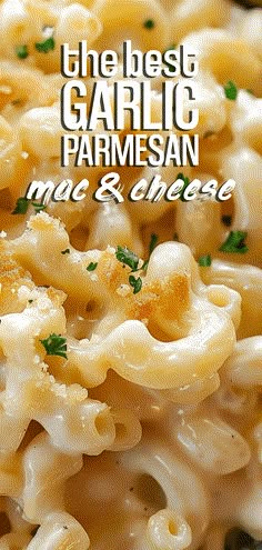 the best garlic parmesan mac and cheese is served on a white plate with green garnish