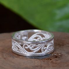 About item Item :- Ring Ring size :- Chose from variation (Custom size accepted) Material  :- 925 Sterling silver Purity  :- 92.5 Title:-Filigree Band Ring, Sterling Silver, Art Nouveau Ring, Openwork Lace, Promise Ring, Bridesmaid Gift, Stackable Ring, Midi Ring, Boho Jewelry Description:- We use 925 sterling silver to making jewelry. We accept all types of custom & personalized order. Please send us a message if you are interested in a custom creation. Shipping profile:- We ship all order with Bohemian Engraved Wedding Ring With Intricate Design, Bohemian Wedding Rings With Intricate Design, Bohemian Sterling Silver Filigree Ring For Wedding, Unique Jewelry With Decorative Band As Gift, Bohemian Rings With Intricate Design For Promise, Adjustable Filigree Ring With Intricate Design For Wedding, Unique Jewelry With Decorative Band For Gift, Bohemian Silver Filigree Wedding Ring, Unique Decorative Band Jewelry Gift