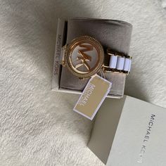 Brand New Michael Kors Watch White And Gold Comes With Box And Tags Michael Kors Timeless Watch As Gift, Timeless Michael Kors Watch As Gift, Michael Kors Round Dial Watch As A Gift, Michael Kors Jewelry With Round Dial For Gifts, Michael Kors Jewelry Gift With Round Dial, Michael Kors Jewelry Gift, Modern White Jewelry With Diamond Hour Markers, Designer White Quartz Watch, White Watches With Diamond Hour Markers As Gift