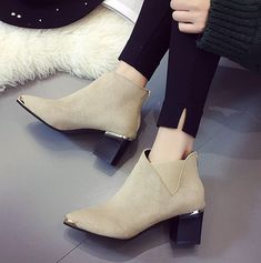 Upper Material: Flock Boot Height: Ankle Closure Type: Zip Boot Type: Basic Toe Shape: Pointed Toe Heel Height: High (5cm-8cm) Heel Type: Square heel Model Number: 8813 Season: Spring/Autumn Insole Material: PU Pattern Type: Solid Outsole Material: Rubber Lining Material: Cotton Fabric Shaft Material: Flock Fit: Fits smaller than usual. Please check this store's sizing info Fashion Element: Metal Decoration Department Name: Adult Item Type: Boots Metal Decorations, Thick Heel Shoes, Thick Heel, Pointed Toe Heels, Martin Boots, Thick Heels, Heeled Ankle Boots, Heel Shoes, Womens Fall