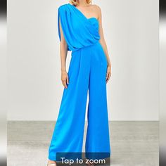 Do + Be Brand One Shoulder Draped Jumpsuit Blue Summer Pantsuit For Party, Fitted Blue Pantsuit For Wedding, Blue Fitted Pantsuit For Weddings, Blue Pantsuit For Summer Party, Elegant Blue Pantsuit For Wedding, Elegant Blue Wedding Jumpsuits And Rompers, Elegant One-shoulder Blue Jumpsuits And Rompers, Elegant Blue One-shoulder Jumpsuit, Elegant Blue Pantsuit For Party