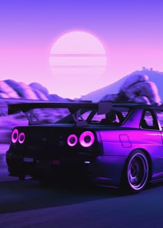 a purple car driving down the road with mountains in the backgrouund and sun behind it