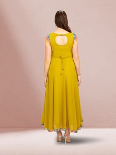 Make a statement with our Harmony Hues yellow fusion flare dress. Crafted from chiffon, this long and flowing umbrella dress is ideal for any occasion, adding a touch of elegance to your ensemble. Elevate your style with this stunning piece. Key Specifications : Material Chiffon Occasion Casual Type Fusion/Indowestern Festive Sleeveless Georgette Dress, Yellow Chiffon A-line Dress, Elegant Yellow Floor-length Chiffon Dress, Green Georgette Maxi Chiffon Dress, Green Georgette Chiffon Maxi Dress, Spring Sleeveless Anarkali Dress, Yellow Georgette Party Dress, Flowy A-line Chiffon Dress In Georgette, Yellow A-line Maxi Dress For Wedding