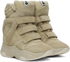 High-top suede sneakers in beige. · Perforated detailing at toe · Velcro straps at vamp · Logo flag at padded tongue · Quilted padded collar · Cutout at sides · Logo embossed at heel · Grained pigskin lining · Concealed wedge heel · Treaded platform rubber sole · Platform: H2 · Heel: H2 Supplier color: Beige Sporty Beige Suede High-top Sneakers, Beige Suede High-top Sneakers With Rubber Sole, Beige Suede High-top Sneakers For Streetwear, Pretty Shoes Sneakers, Suede Wedges, Wedge Sneakers, Suede Sneakers, Pretty Shoes, Velcro Straps